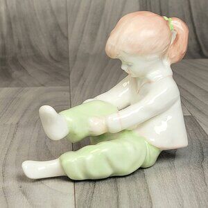 Vintage Budapest Hungary Girl Dressing Porcelain Figurine